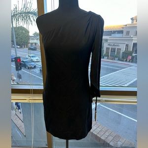 Asymmetrical black dress with gold metal strings